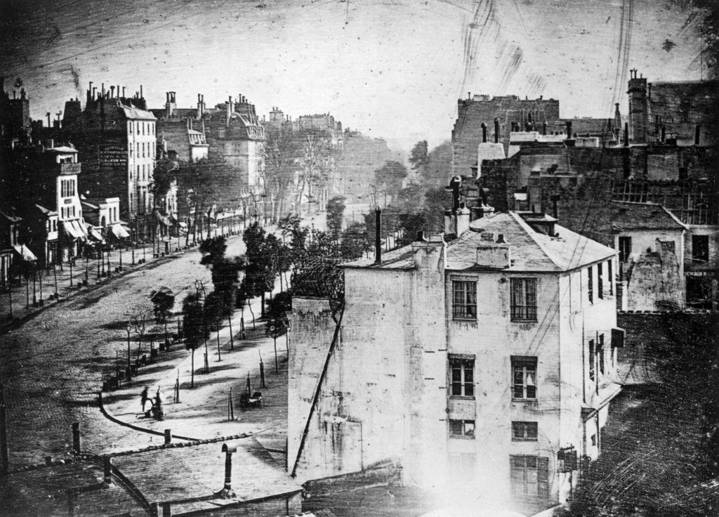 %22Boulevard du Temple%22, a daguerreotype made by Louis Daguerre in 1838, is generally accepted as the earliest photograph to include people.