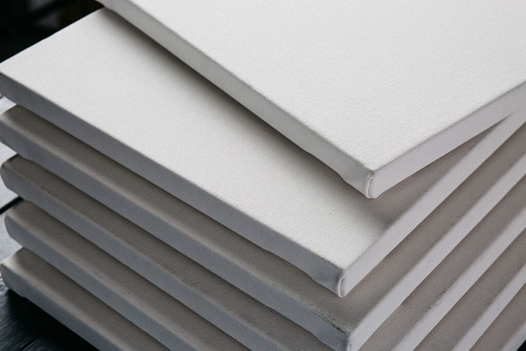 stack of canvases